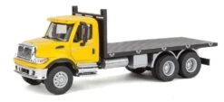 Walthers SceneMaster International? 7600 3-Axle Flatbed Truck - Assembled -- Yellow Cab, Black Fla