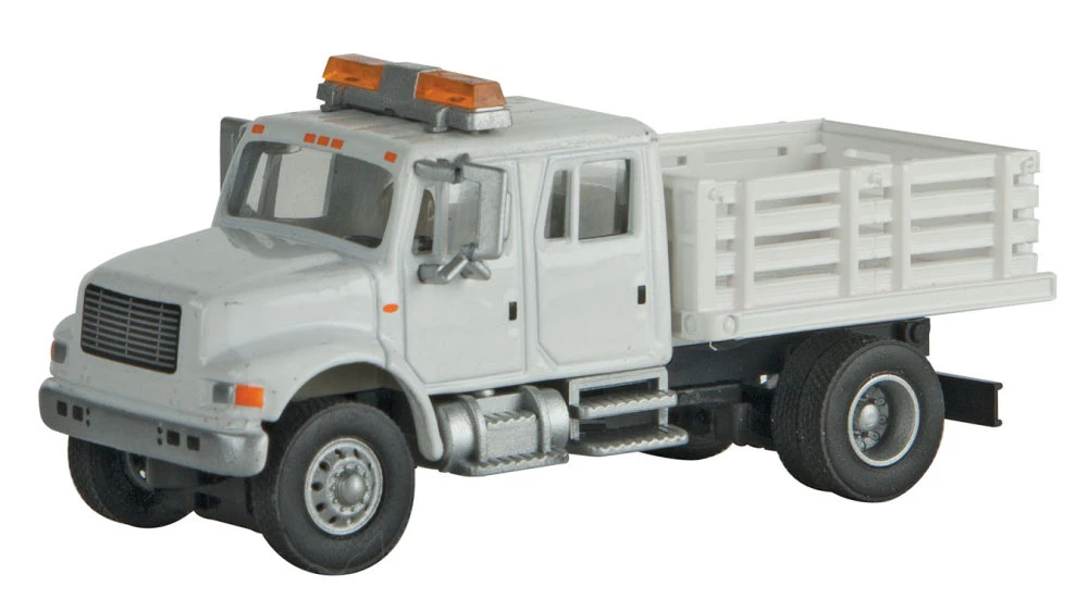 Walthers SceneMaster International? 4900 Open Stake Bed Utility Truck - Assembled -- White W/Railr 3 Walthers SceneMaster International? 4900 Open Stake Bed Utility Truck - Assembled -- White W/Railr